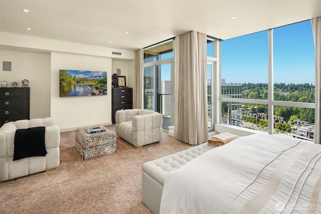 10650 NE 9th Pl Unit 2524, Bellevue, WA 98004 - bedroom featuring floor to ceiling windows, carpet, and recessed lighting