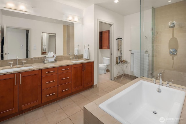 10650 NE 9th Pl Unit 2524, Bellevue, WA 98004 - full bath with tiled tub, double vanity, tile patterned floors, a stall shower, and recessed lighting