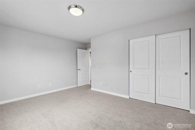 298 Hovey St, Buckley, WA 98321 - unfurnished bedroom featuring carpet flooring and a closet
