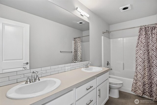 298 Hovey St, Buckley, WA 98321 - bathroom with double vanity, shower / tub combo, and tile patterned flooring