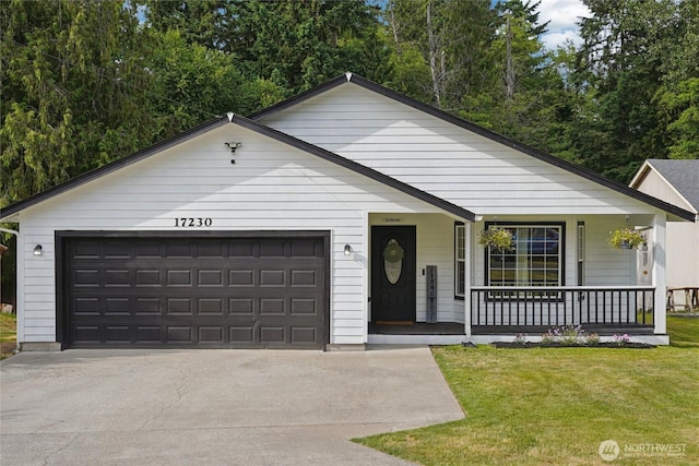 17230 Heather Ln SE, Yelm, WA 98597 - ranch-style home with covered porch, a garage, driveway, and a front lawn