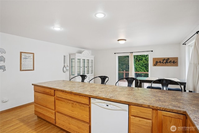 17230 Heather Ln SE, Yelm, WA 98597 - kitchen featuring white dishwasher, light wood finished floors, and recessed lighting