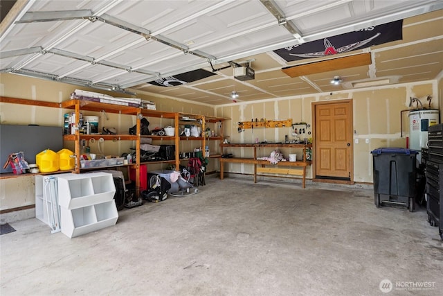 17230 Heather Ln SE, Yelm, WA 98597 - garage featuring a garage door opener and water heater