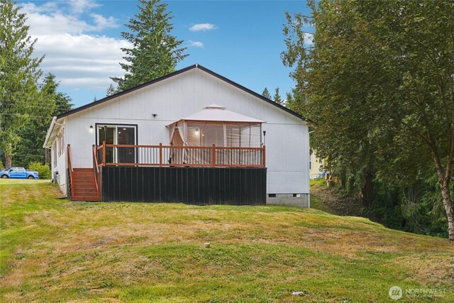 17230 Heather Ln SE, Yelm, WA 98597 - rear view of property with crawl space, a lawn, and a deck