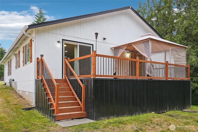 17230 Heather Ln SE, Yelm, WA 98597 - rear view of house with a gazebo, a deck, and a yard