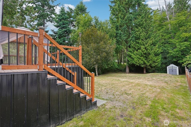 17230 Heather Ln SE, Yelm, WA 98597 - view of green lawn featuring stairway and a storage shed