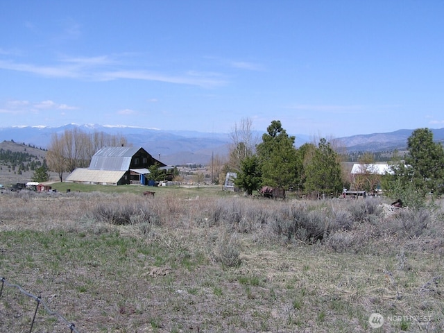 361 Rehmke Rd, Tonasket, WA 98855 - view of mountain background featuring rural landscape