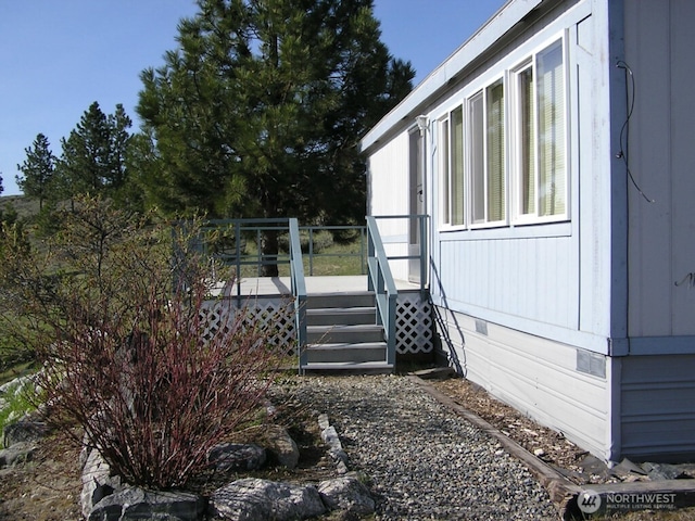361 Rehmke Rd, Tonasket, WA 98855 - view of home's exterior featuring crawl space and a deck