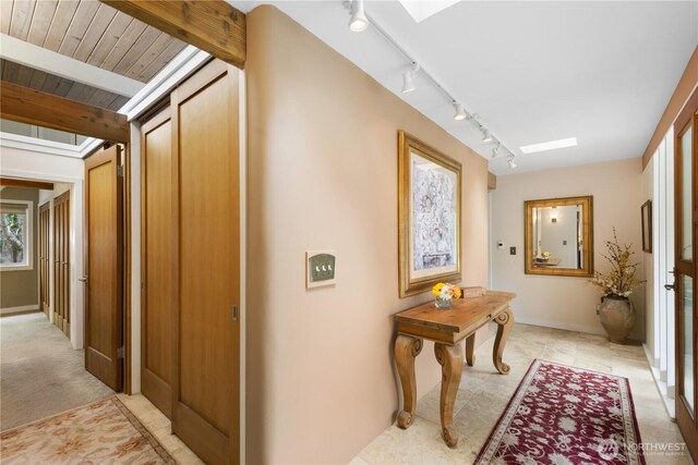7623 NE 123rd St, Kirkland, WA 98034 - hallway with track lighting and a skylight