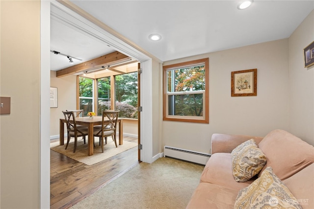 7623 NE 123rd St, Kirkland, WA 98034 - living room featuring a baseboard radiator, recessed lighting, and light wood-style flooring