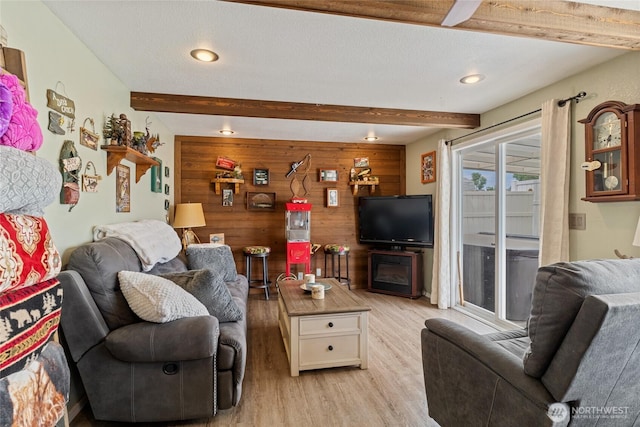 327 N Grape Dr, Moses Lake, WA 98837 - living area featuring wood walls, light wood finished floors, beamed ceiling, and recessed lighting