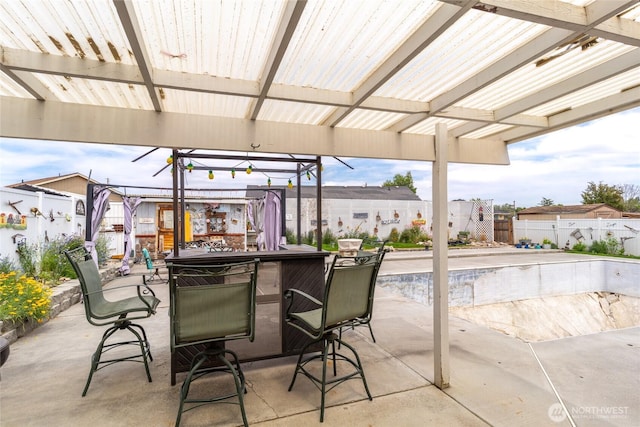 327 N Grape Dr, Moses Lake, WA 98837 - fenced backyard with a patio area and a residential view