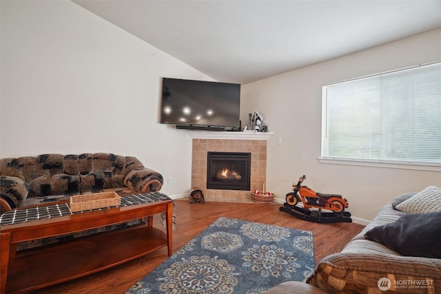 16 NW 23rd St, Battle Ground, WA 98604 - living room featuring lofted ceiling, a fireplace, and wood finished floors