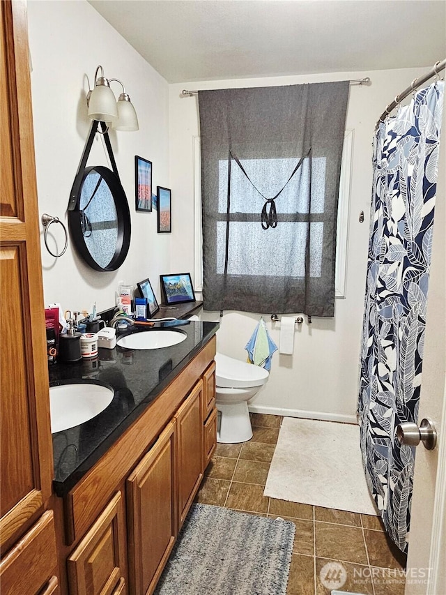 591 Division Ave, Morton, WA 98356 - bathroom with double vanity, tile patterned floors, and curtained shower