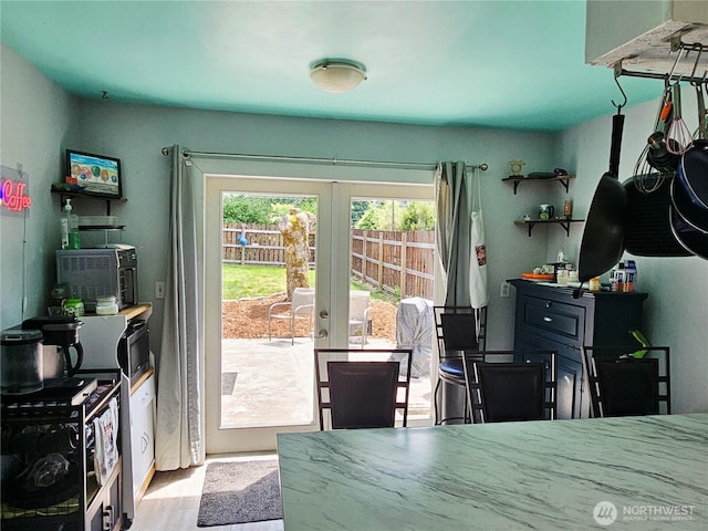 591 Division Ave, Morton, WA 98356 - dining room featuring french doors and wood finished floors