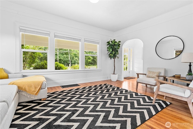 1584 Main St, Lynden, WA 98264 - sitting room featuring arched walkways and wood finished floors