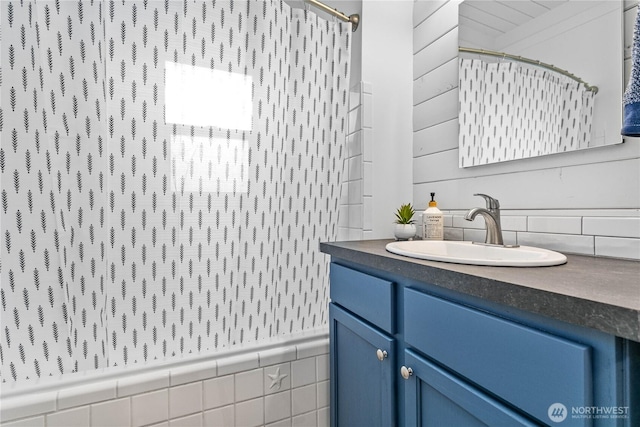1584 Main St, Lynden, WA 98264 - bathroom featuring vanity, a shower with shower curtain, and decorative backsplash