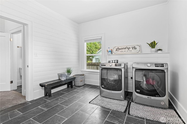 1584 Main St, Lynden, WA 98264 - washroom featuring separate washer and dryer, crown molding, and wooden walls