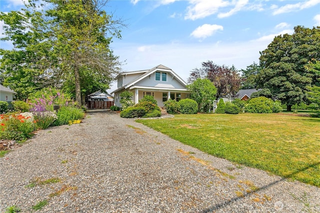 1584 Main St, Lynden, WA 98264 - view of front of home with gravel driveway and a porch