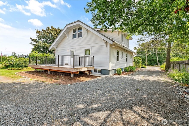 1584 Main St, Lynden, WA 98264 - view of side of home with a deck