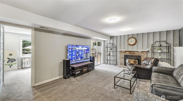 12350 SE 96th Pl, Renton, WA 98056 - carpeted living room featuring plenty of natural light and a brick fireplace