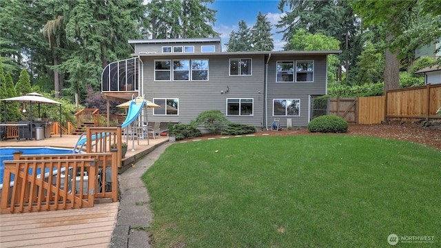 12350 SE 96th Pl, Renton, WA 98056 - back of house with a sunroom and a wooden deck