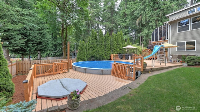 12350 SE 96th Pl, Renton, WA 98056 - view of swimming pool featuring a wooden deck and a water slide