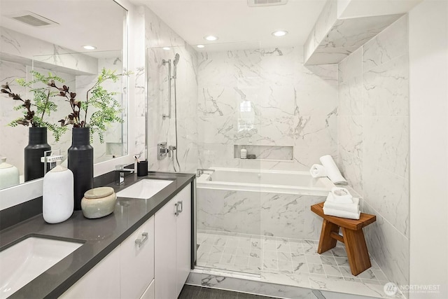 527 16th Ave W, Kirkland, WA 98033 - bathroom with a garden tub, double vanity, and recessed lighting
