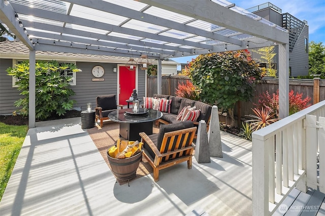 527 16th Ave W, Kirkland, WA 98033 - deck featuring a pergola, an outdoor living space, and a patio