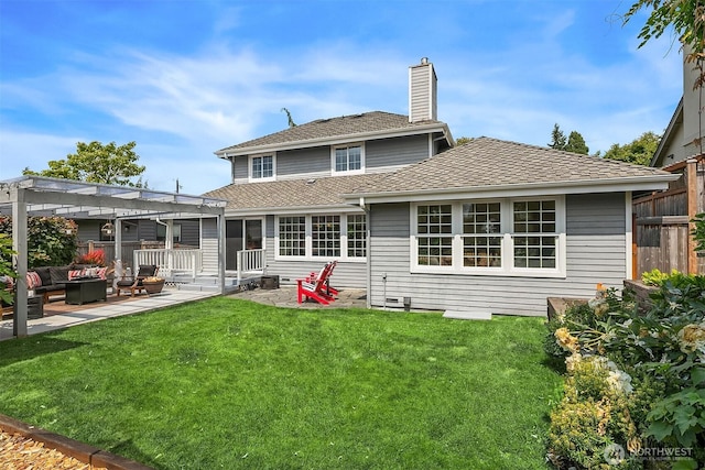 527 16th Ave W, Kirkland, WA 98033 - back of property featuring a pergola, outdoor lounge area, a patio, a chimney, and roof with shingles