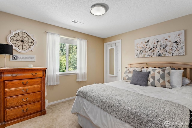 14908 NE 70th St, Vancouver, WA 98682 - bedroom featuring light carpet and a textured ceiling