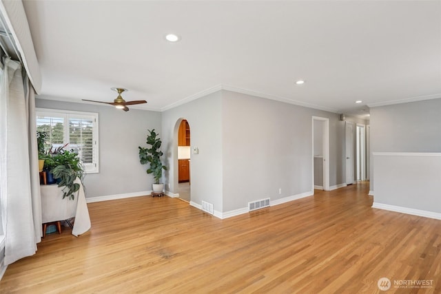 806 SW 126th St, Seattle, WA 98146 - spare room featuring recessed lighting, arched walkways, ceiling fan, light wood finished floors, and crown molding