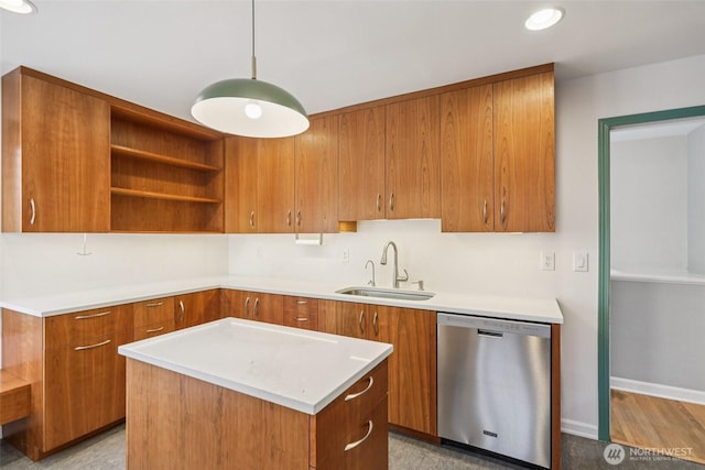 806 SW 126th St, Seattle, WA 98146 - kitchen featuring stainless steel dishwasher, brown cabinets, light countertops, a kitchen island, and recessed lighting