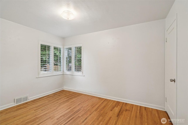 806 SW 126th St, Seattle, WA 98146 - unfurnished room with baseboards and light wood-style floors