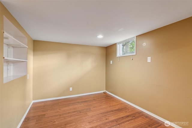 806 SW 126th St, Seattle, WA 98146 - basement featuring wood finished floors and recessed lighting