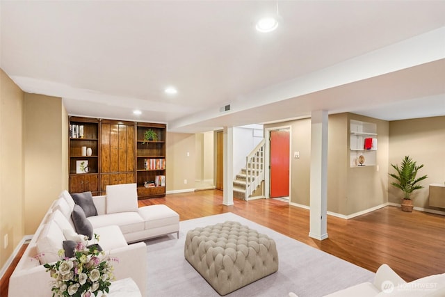 806 SW 126th St, Seattle, WA 98146 - living area featuring wood finished floors, recessed lighting, stairway, and built in shelves