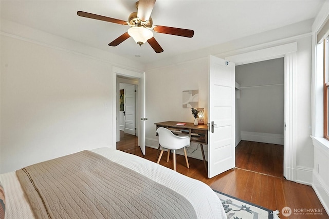 3647 Renton Ave S, Seattle, WA 98144 - bedroom with wood finished floors, a ceiling fan, a closet, and a spacious closet