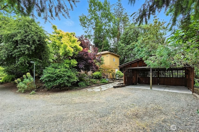 3647 Renton Ave S, Seattle, WA 98144 - view of yard with a carport and driveway