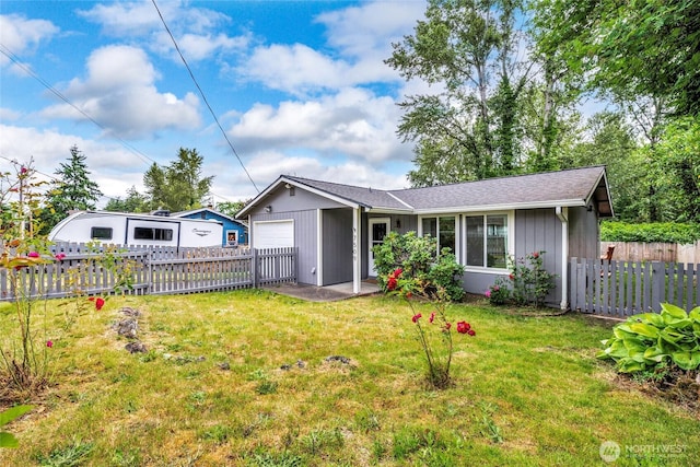 7509 E F St, Tacoma, WA 98404 - view of front facade featuring an attached garage