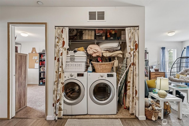 3178 Hoffman Hill Blvd, Dupont, WA 98327 - washroom with washing machine and clothes dryer and wood finished floors