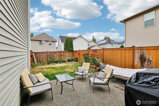 3178 Hoffman Hill Blvd, Dupont, WA 98327 - fenced backyard featuring a patio area, a residential view, and outdoor lounge area