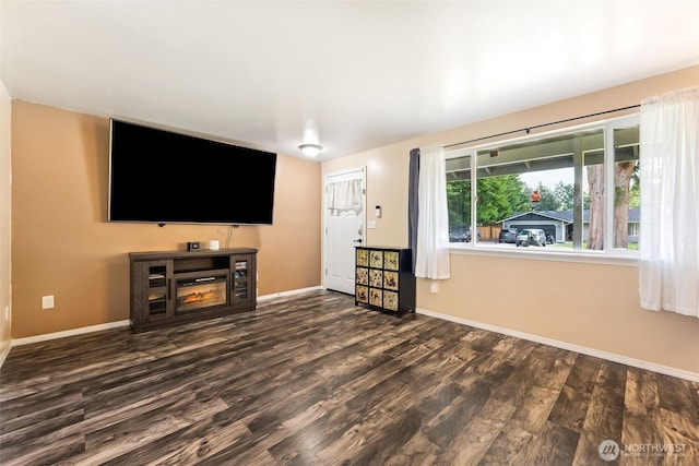 17602 154th Way SE, Yelm, WA 98597 - unfurnished living room featuring wood finished floors and baseboards