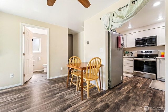 17602 154th Way SE, Yelm, WA 98597 - kitchen featuring appliances with stainless steel finishes, a ceiling fan, dark wood-style flooring, white cabinets, and recessed lighting