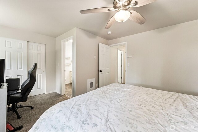 17602 154th Way SE, Yelm, WA 98597 - bedroom featuring dark carpet, an office area, ceiling fan, a closet, and connected bathroom
