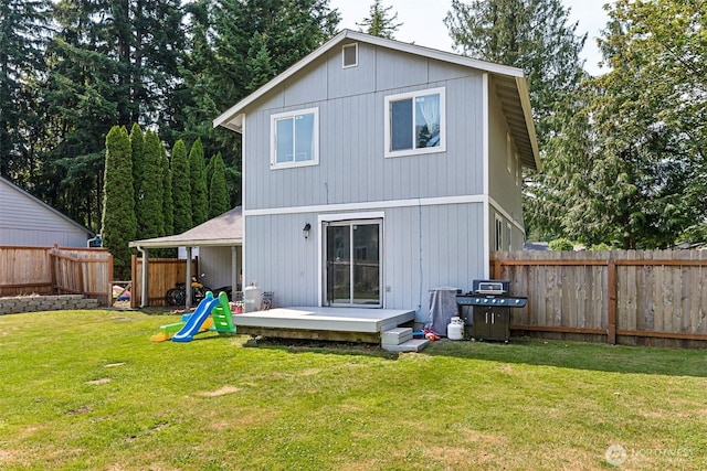 17602 154th Way SE, Yelm, WA 98597 - back of house featuring a deck and a fenced backyard