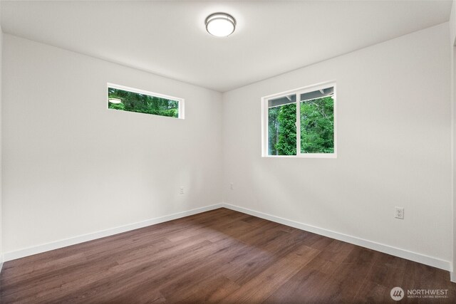 754 SW Oak Rd, Port Orchard, WA 98367 - empty room featuring plenty of natural light and dark wood-style floors
