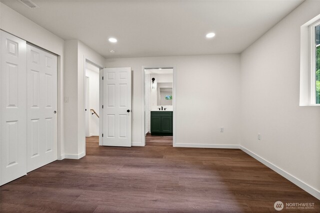754 SW Oak Rd, Port Orchard, WA 98367 - unfurnished bedroom featuring recessed lighting, dark wood-type flooring, ensuite bath, and a closet