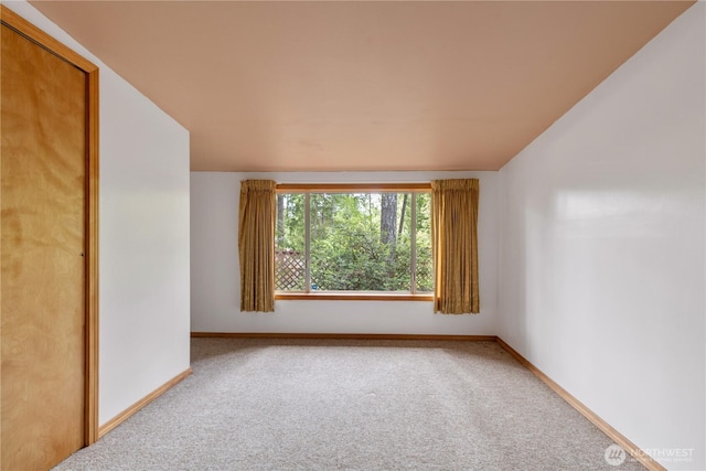 1681 E Saint Andrews Dr N, Shelton, WA 98584 - carpeted empty room featuring baseboards and vaulted ceiling