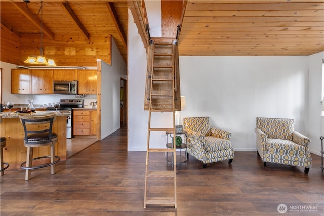 1681 E Saint Andrews Dr N, Shelton, WA 98584 - sitting room featuring a wood ceiling with exposed beams, dark wood finished floors, and high vaulted ceiling