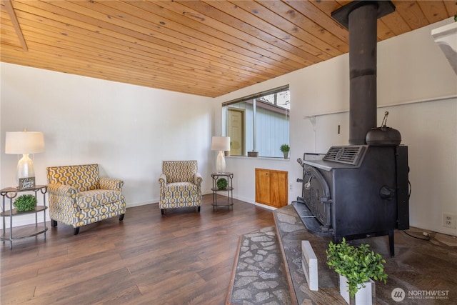 1681 E Saint Andrews Dr N, Shelton, WA 98584 - living area featuring a wood stove, wooden ceiling, and wood finished floors